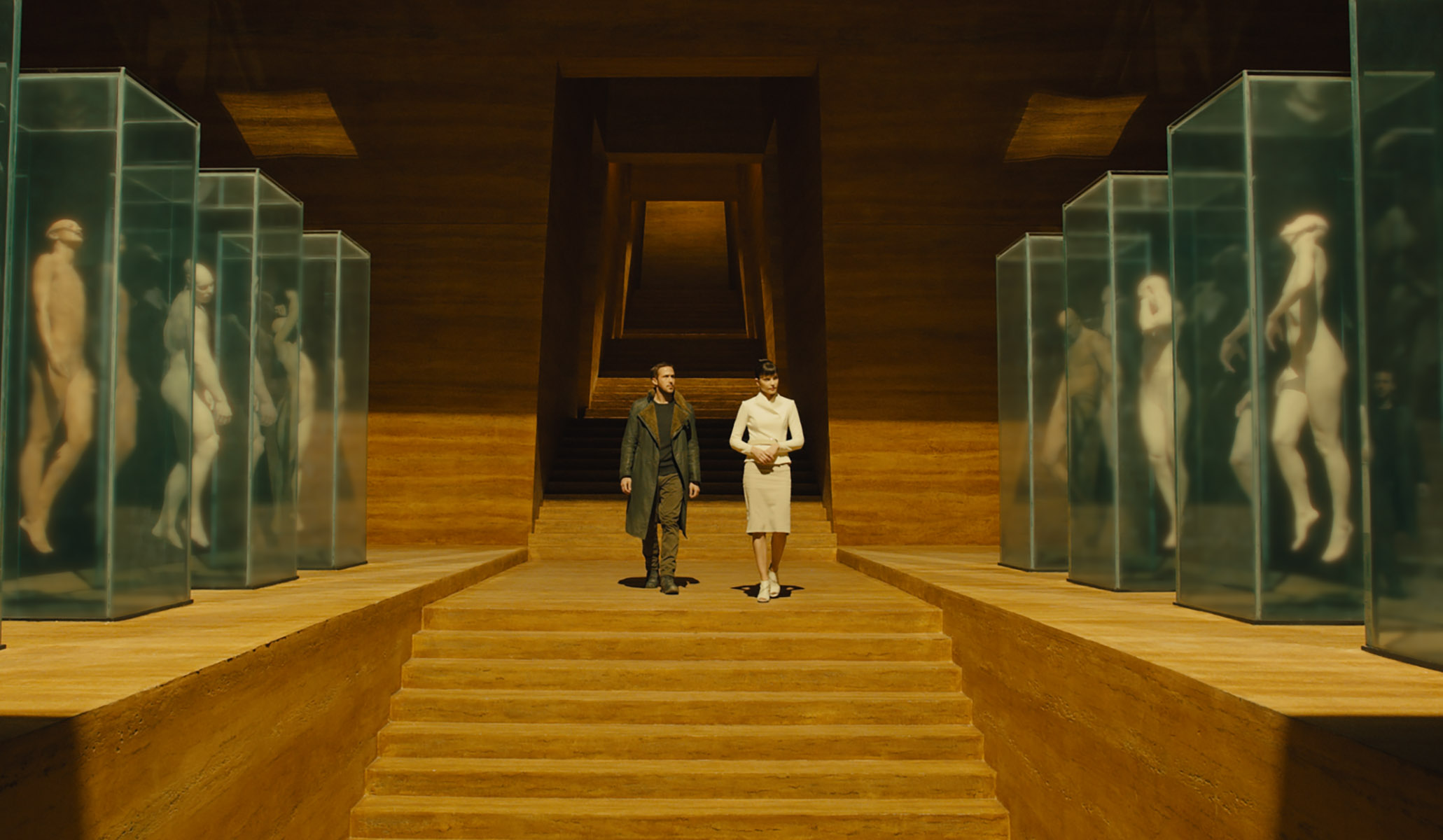 (L-R) RYAN GOSLING as K and SYLVIA HOEKS as Luv in Alcon Entertainment's action thriller "BLADE RUNNER 2049," a Warner Bros. Pictures and Sony Pictures Entertainment release, domestic distribution by Warner Bros. Pictures and international distribution by Sony Pictures. Photo Credit: Courtesy of Alcon Entertainment. Copyright: © 2017 ALCON ENTERTAINMENT, LLC