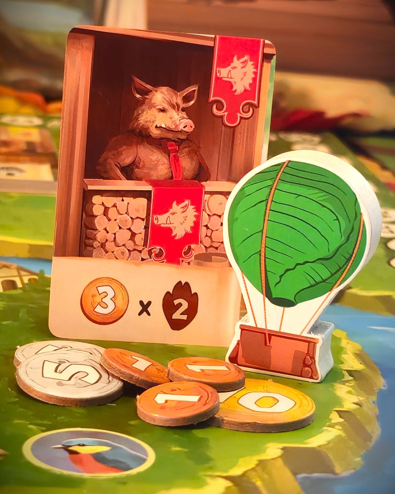 Une carte de la Guilde des sangliers et la Montgolfière.